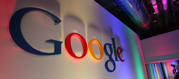 Google logo on a wall lit from below