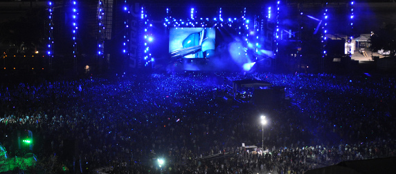 crowds in front of a lit stage at night at the Ultra Music Festival in 2011