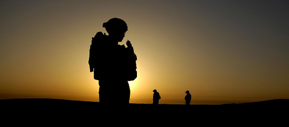 sillouhette of an Iraq War soldier against a sunset