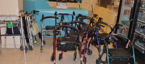 walkers clustered in front of a counter