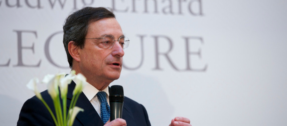 ECB Chariman Mario Draghi speaking with a microphone