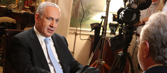 Benjamin Netanyahu in the midst of filming a television interview with Wolf Blitzer