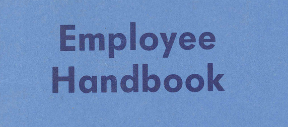 employee handbook title on blue paper