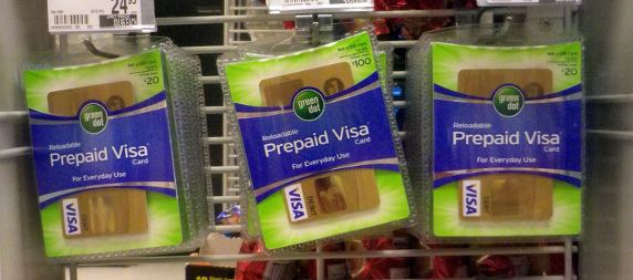 prepaid Visa debit cards hanging on a display for sale