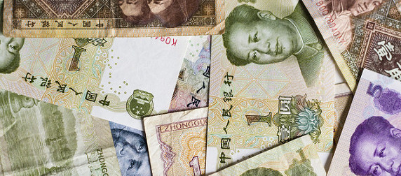 collection of yuan bills, arranged at random