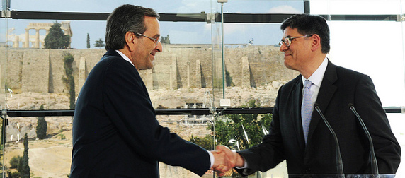 Jack Lew and Antonis Samaras shaking hands