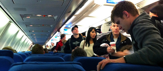 passengers in the process of boarding an airplane