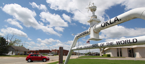 Cushing, Oklahoma City Hall, with structure reading Cushing Okla., Pipeline Crossroads of the World