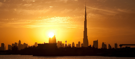 the Dubai skyline at sunset