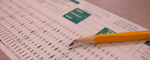 a broken pencil on top of a Scantron test form