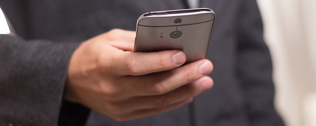 closeup of a hand holding a smartphone