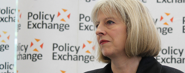 Theresa May in front of a Policy Exchange background