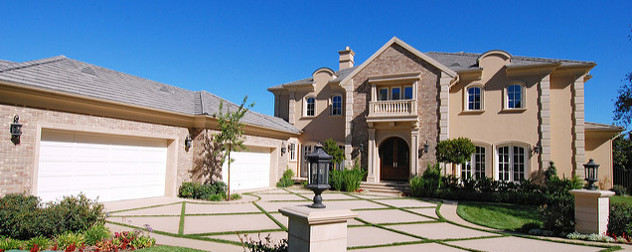 facade of a large house with a detached garage