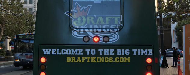 bus ad for DraftKings with the tagline 'Welcome to the Big Time'