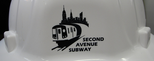 detail of a hard hat with a Second Avenue Subway logo