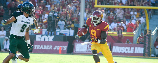 Marqise Lee in USC uniform playing football