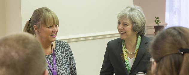 Theresa May visitng a mental health centre in Surrey