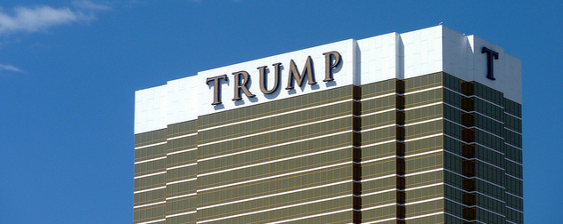 facade of the Trump International Hotel against a blue sky