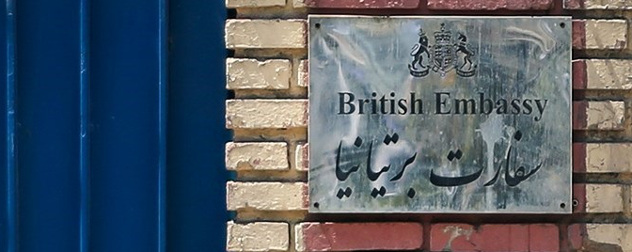 sign that reads British Embassy in English and Persian