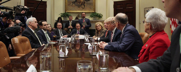Donald Trump, Mike Pence and various congressional Republicans meet at the White House while the press looks on