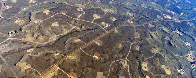 landscape with hydraulic fracturing features, seen from the air