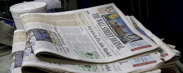 stack of copies of The Wall Street Journal