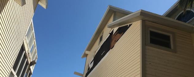 post-Hurricane Irma siding damage