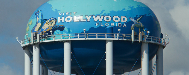 painted water tower with sea turtles and the message 'Visit Hollywood Florida'