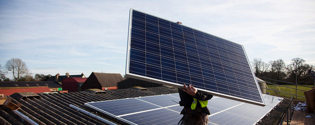 installer adding roof solar panels