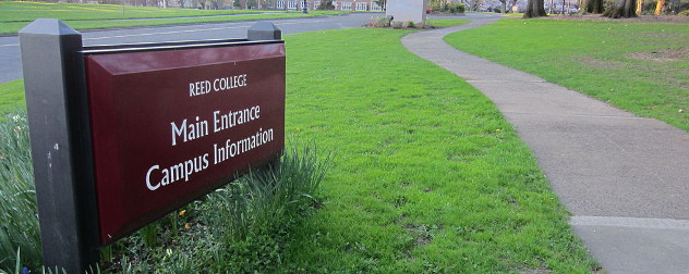 Sign that reads 'Reed College Main Entrance Campus Information'