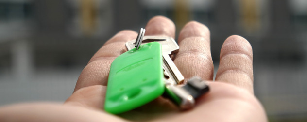 set of keys resting on an open, outstretched hand