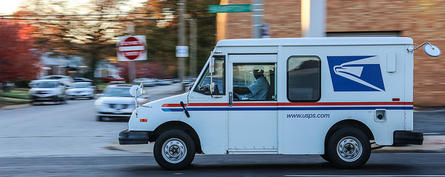 USPS truck in motion