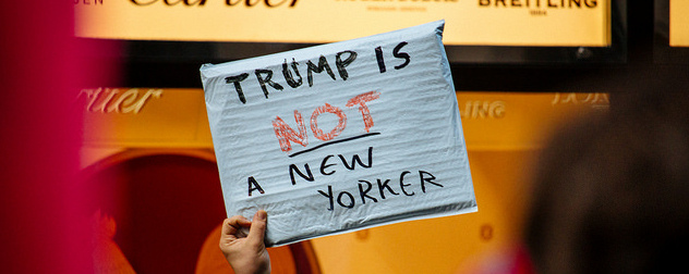 protest sign that reads 'Trump Is Not A New Yorker'