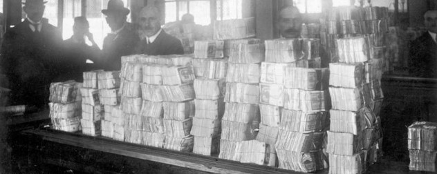 a large pile of cash on a countertop in the Reichsbank, Berlin