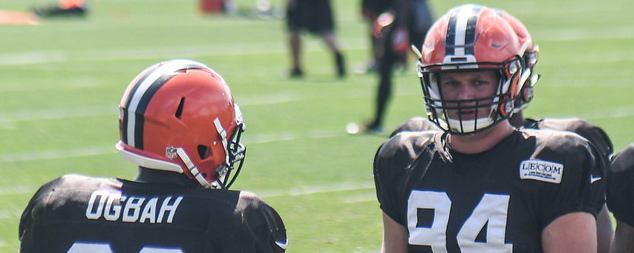 Carl Nassib (face on) and Emmanuel Ogbah (from behind) in Cleveland Browns uniforms