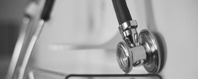 detail of a doctor's stethoscope in a grayscale image