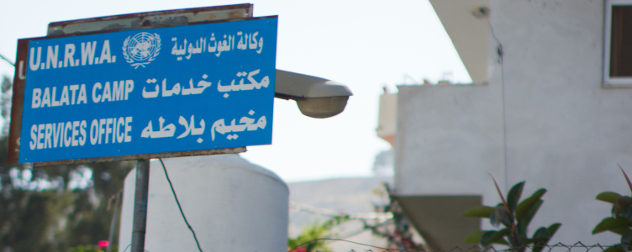 sign in Arabic and English: 'U.N.R.W.A./Balata Camp/Services Office'