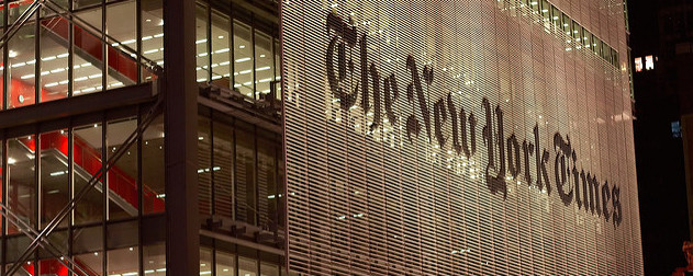 The New York Times building facade at night