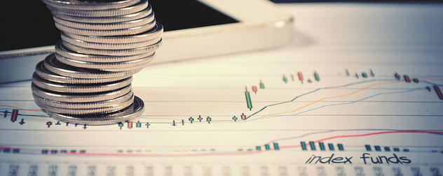 chart labeled 'index funds' with a stack of coins and a smartphone.