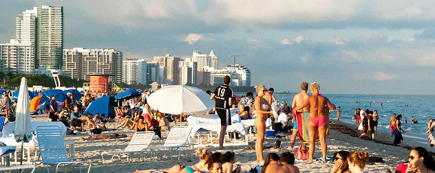 busy beach scene in Miami Beach, Florida.