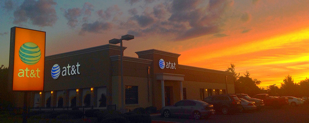 a stand-alone AT&T store at sunset.