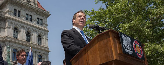 Andrew Cuomo speaking outside the New York State Capitol.