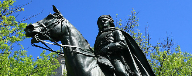 statue of Casimir Pulaski on horseback, seen from below.