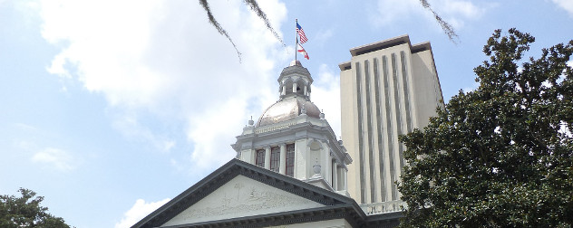 Florida's historic Capitol in the foreground, and the current Florida State Capitol in the background.