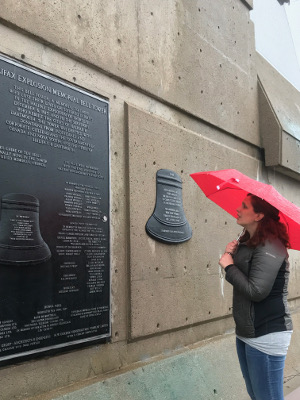 Aline Pitney, with umbrella, at the Halifax Explosion Memorial.