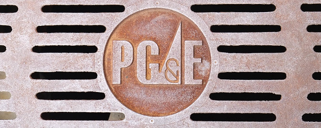 PG&E (a major California utility) logo on a grate.