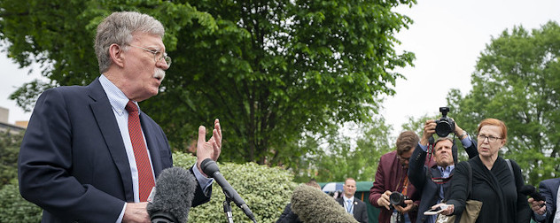 former White House National Security Advisor John Bolton speaking to the press.