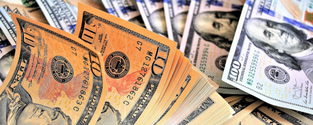 close-up image of $10 and $100 bills.