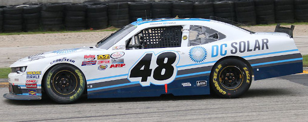 NASCAR stock car driver, Brennan Poole, in a car sponsored by DC Solar.