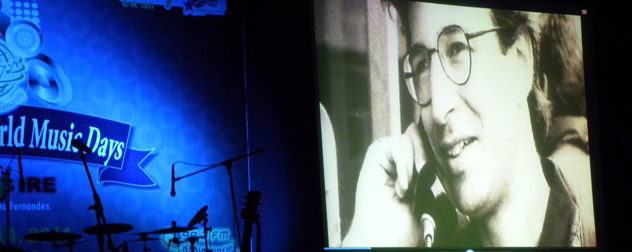 photograph of journalist Daniel Pearl displayed at a memorial concert.